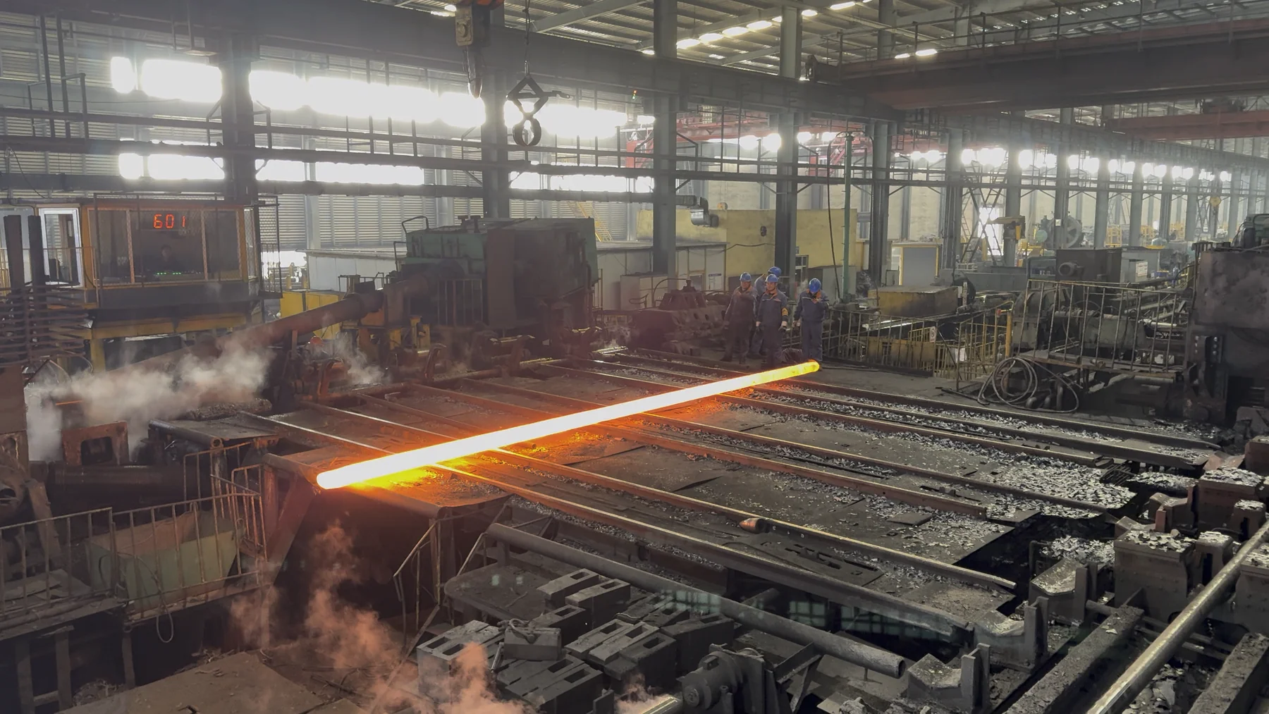 Heated tube on the roller conveyor
