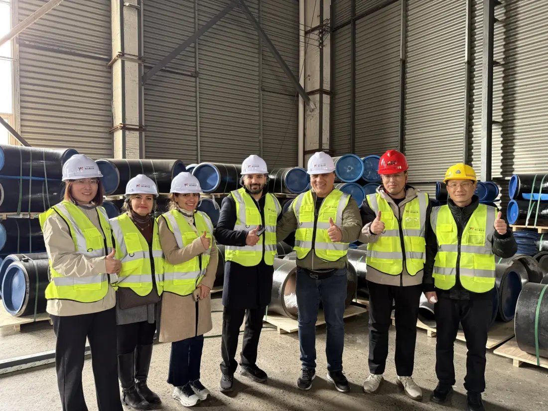 Sales and customer teams during a pipe fittings warehouse visit