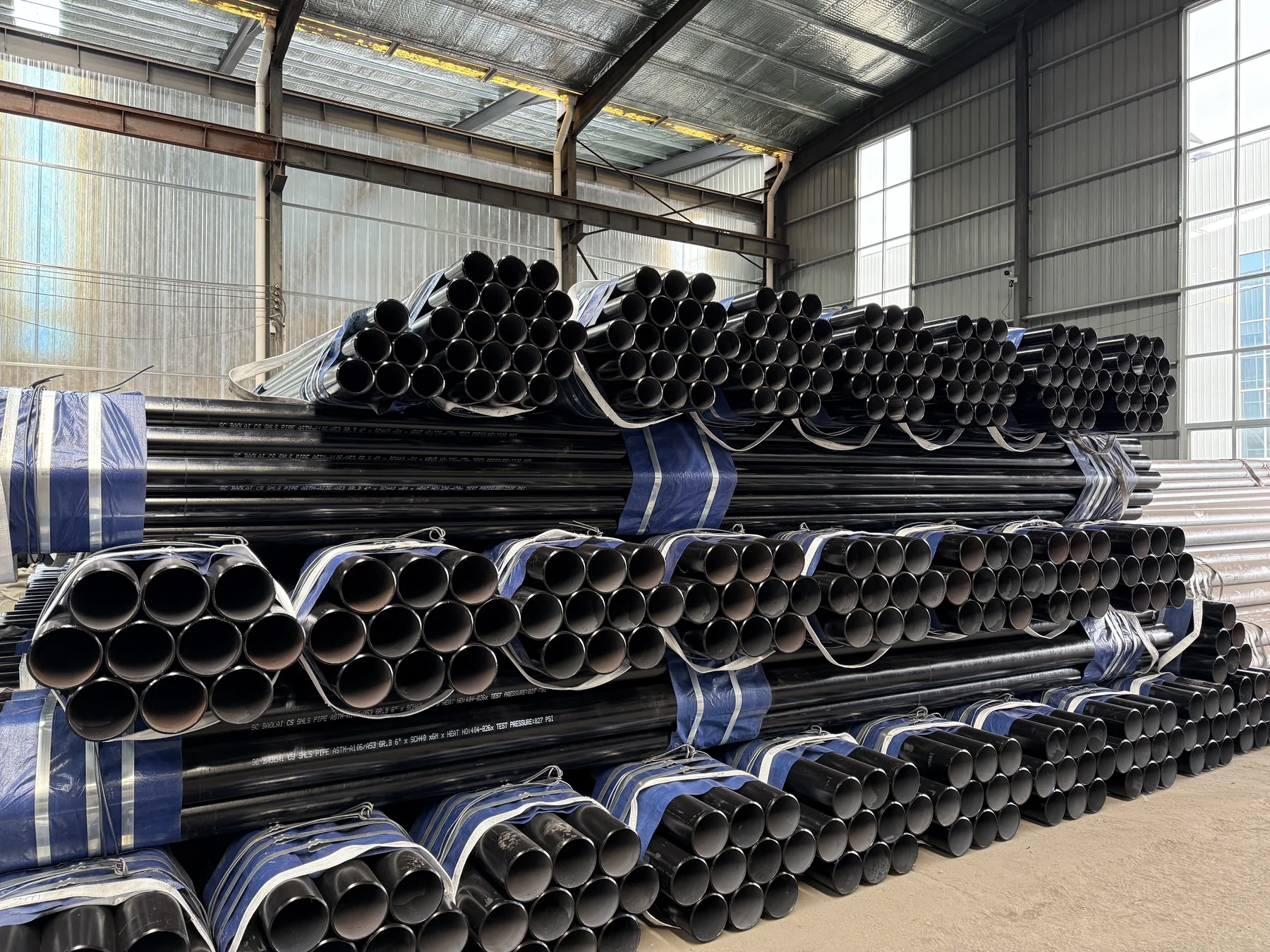 Rows of stacked steel pipe bundles
