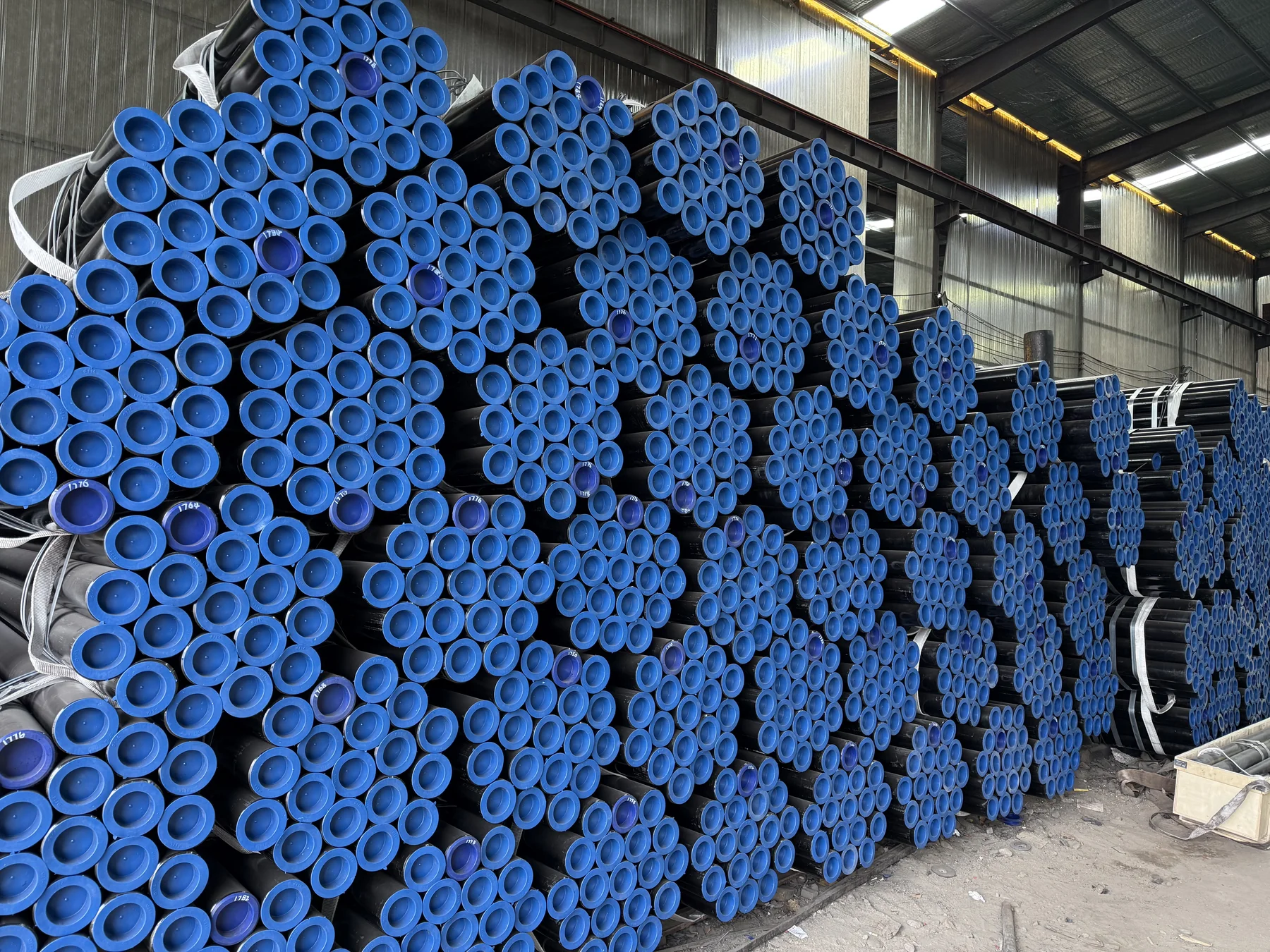 Steel pipe inventory with blue end caps