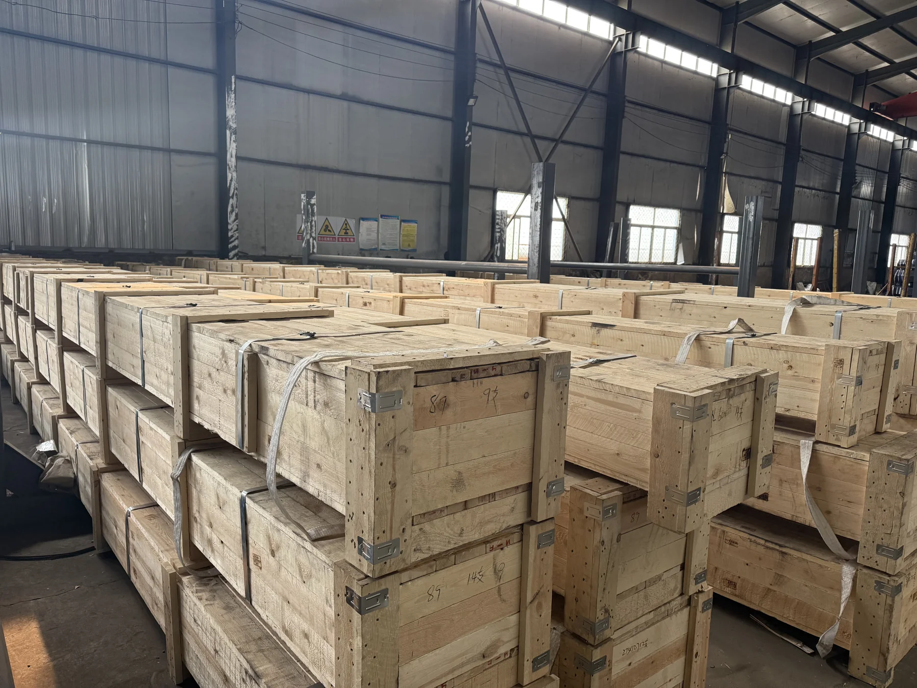 Wooden packing crates stacked in the warehouse
