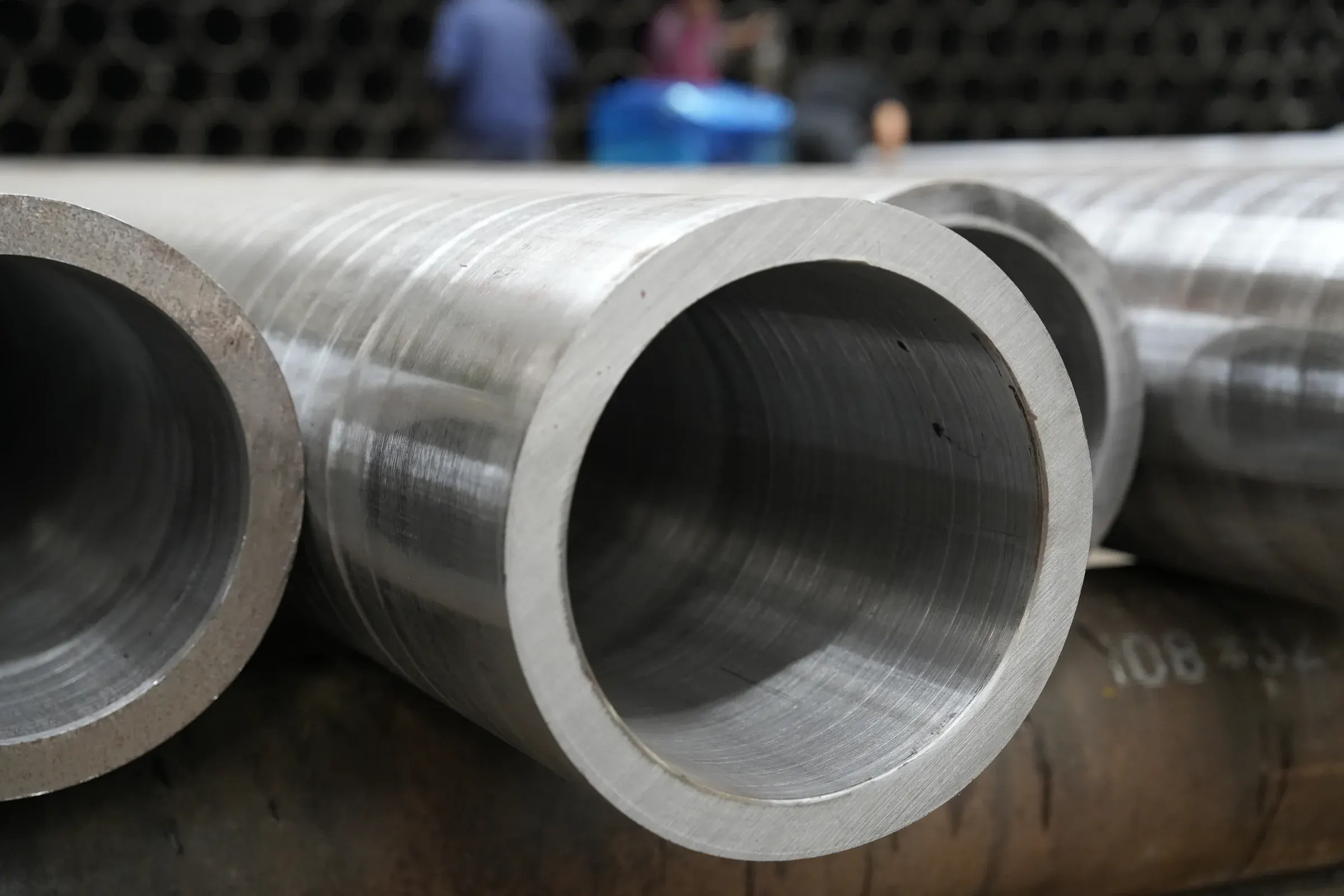 Close-up of thick-wall steel pipe ends and inner surfaces